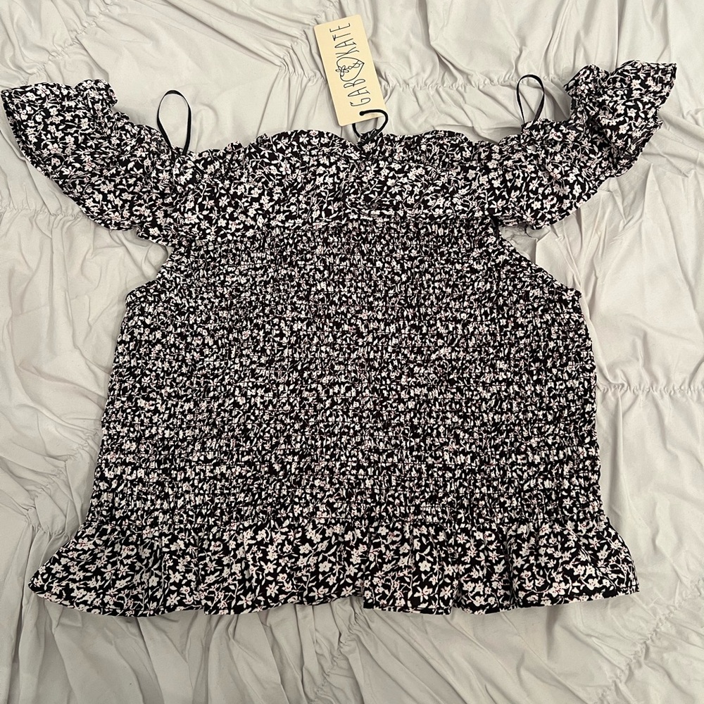Smocked black and white off the shoulder top. Size Small